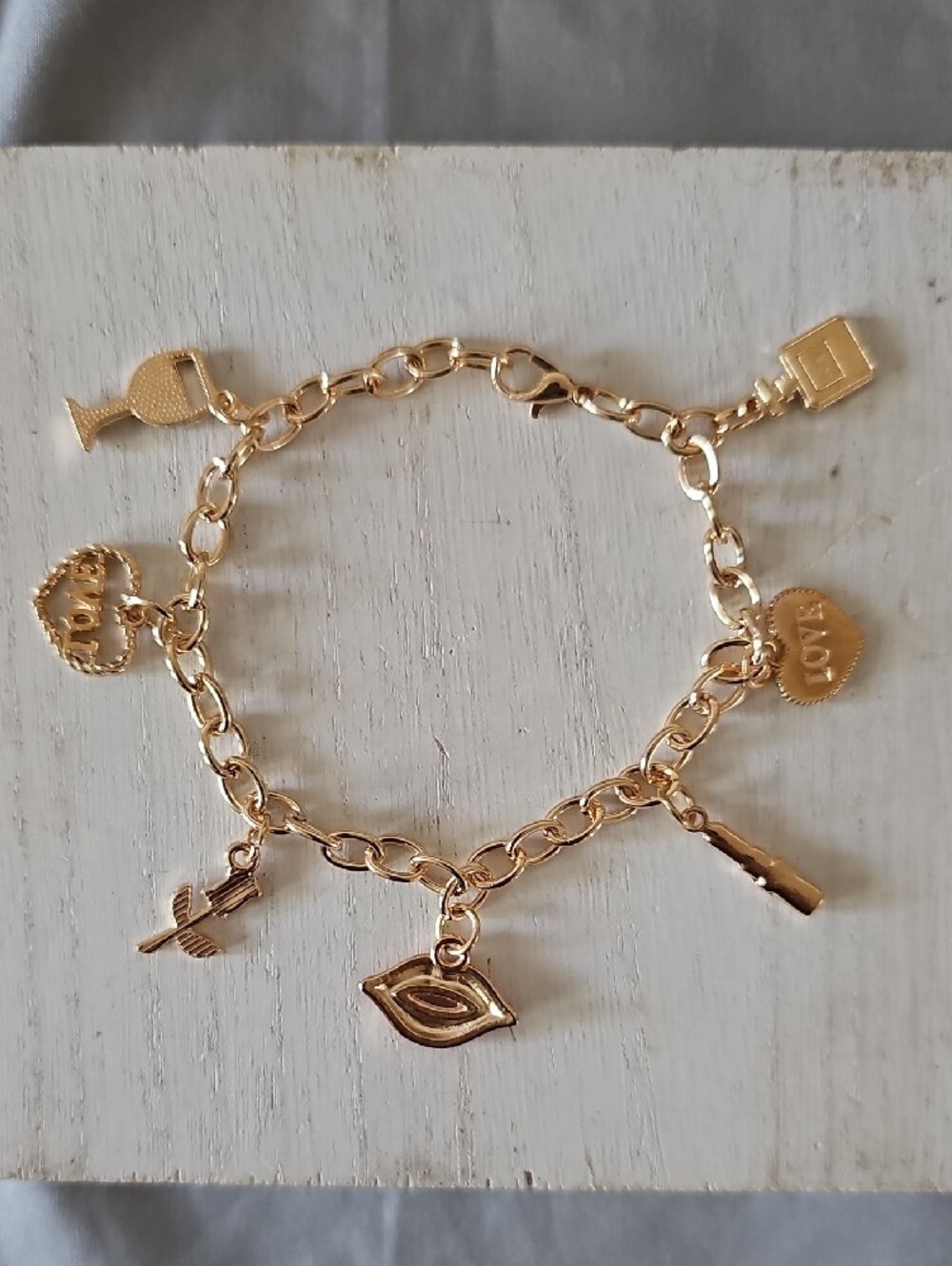 Gold-Tone Charm Bracelet with Red Enamel Accents - Picture 6 of 7